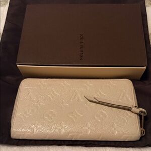 Louis Vuitton Cream Zip-Around Embossed Monogram Wallet with Gold Hardware